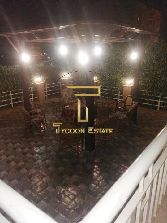 شقة مفروشة للإيجار بحديقة في مدينتي - تايكون العقاري