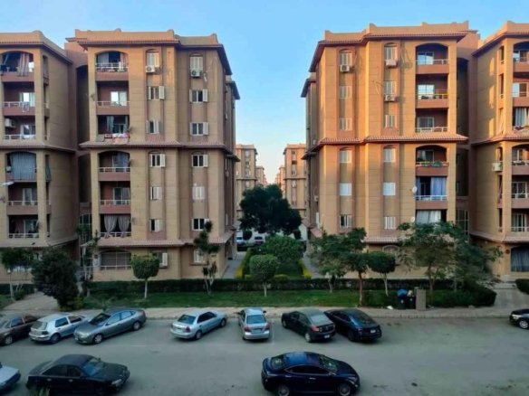 صورة رمزية لنموذج عمارة توضح شكل شقة 120م بقطاع 900 للبيع في مدينة المستقبل الهايكستب، مقدمة من تايكون العقاري.